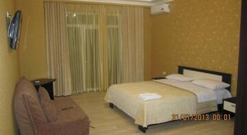 Трехместный номер в Гостинице Grand Paradise